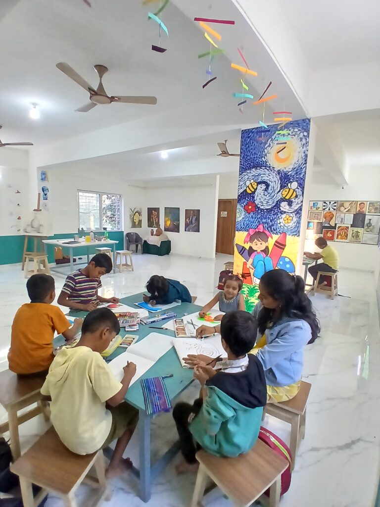 Kids and adults learning drawing and painting at Kalanyas Art Classes in Dighi, Pune