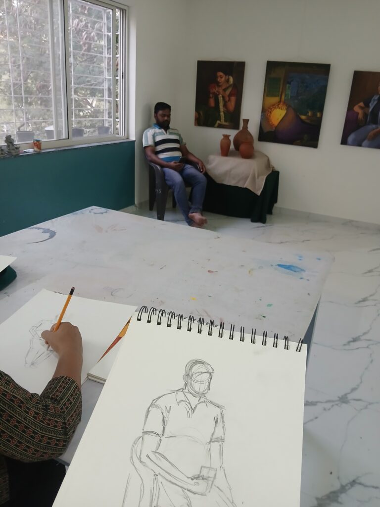 Students practicing live model drawing at Kalanyas Art Classes, Dighi Pune